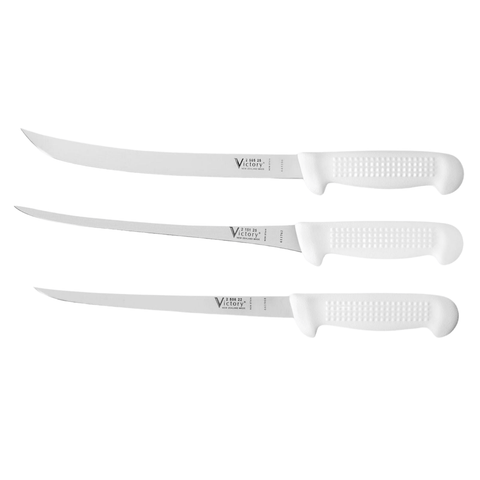 a set of three knives sitting next to each other