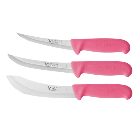 a set of three knives with pink handles